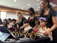 La Sonnette members Meagan Nims, Harmony John and Jairine Almeida teach young students how to play the bells in South Korea. La Sonnette members Meagan Nims, Harmony John and Jairine Almeida teach young students how to play the bells in South Korea.