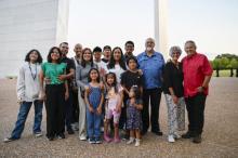Members from the Mountain View Conference Delegation pose in front of the St. Louis arch. 