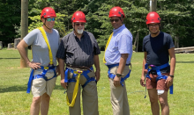 Bob Cundiff, Ohio Conference president; Tim Bailey, Mountain View Conference (MVC) president; Marcellus T. Robinson, Columbia Union Conference president; and Walter Cardenas, assistant to the MVC president, prepare for the ropes course.