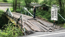 A flash flood in 2015 destroyed this bridge, making it nearly impossible for 13 Pigeon Creek families to get access to food and medical care.
