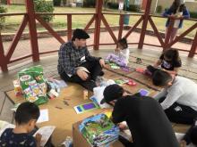 CORE student Matthew Ullom tells Bible stories to refugee children during a recent mission trip.
