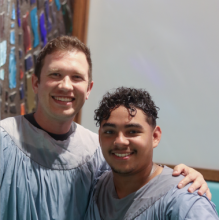 João Marques, alongside Blue Mountain Academy Pastor Adam Bially, celebrate his baptism together.