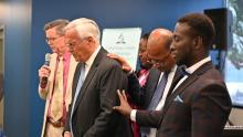 Pastor Greg Carlson and the Columbia Union Executive Officers pray over Rubén Ramos before his retirement. 