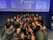 Flanked by the Pine Forge Academy choir, Director Jarrett Roseborough and choir member Kaitlyn Lyseight-Shields (’25) hold the awards for Best Youth Choir and Best Overall Performers at WHYY’s Lifting Voices in Praise Gospel event.