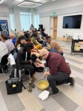 Steve Leddy, Potomac Conference associate Ministerial director for Church Planting, participates in a foot-washing ceremony at the elders’ annual retreat.
