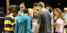 During opening night of SALT, students pray for each other’s fears during an icebreaker activity.