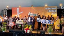 Representatives from the seven language groups that comprise Hispanic Ministries deliver the theme of the camp meeting in their native language.