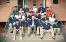 The Freshman Boys Life Skills class sits with Buz Menhardt, associate pastor of the New Market church.