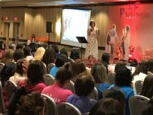 Elisa Maragoto, principal of the Lake Nelson Adventist Academy in Piscataway, N.J., speaks at the Hispanic Women’s Retreat.