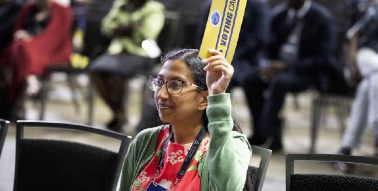 Leena Moses, a young adult delegate from the Potomac Conference, participates in the voting process during the General Conference Session. Photo by Nathaniel Reid/AME (CC BY 4.0)