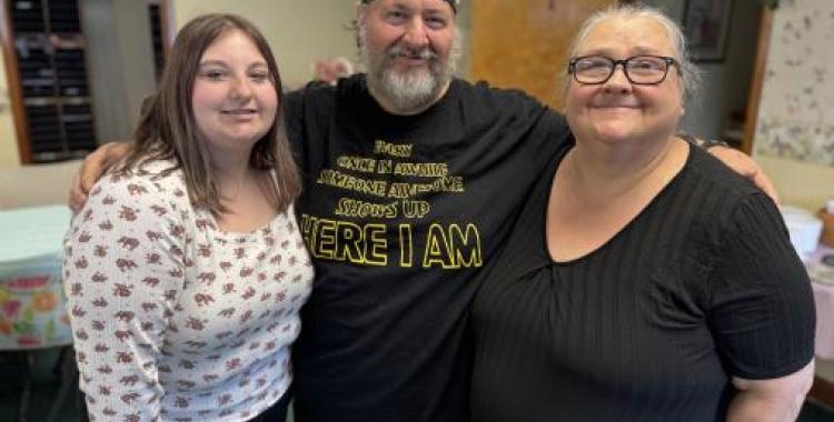 The Evans family—Valerie, Owen and Rosemary— join the Grace Outreach church following an evangelistic series.
