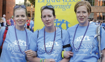 The author (center) relied on friends Kristen Pangborn (left) and Lisa Wolfe to support her through the emotional walk..