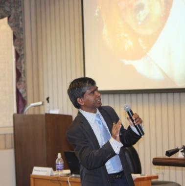Jacob Prabhakar Chindrupu, MD, shows a video clip of one of his cataract surgeries.