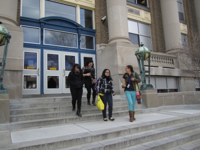 A Simplicity member chats with local high school students after a meeting of their Christian club.