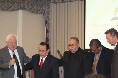 Pictured in prayer are (left to right) Rob Vandeman, union executive secretary; José H. Cortés, New Jersey Conference president; Henry J. Fordham, Allegheny East Conference president; Seth Bardu, union treasurer; and Dave Weigley, union president.