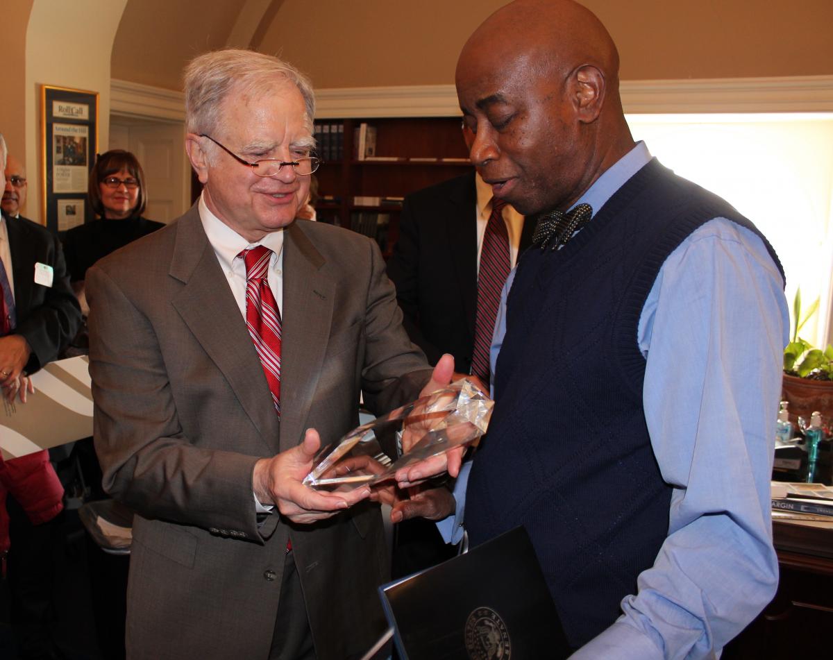 Carson is pictured presenting an award to U.S. Senate Chaplain Barry Black in 2014.