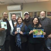 Jerry Woods, WGTS 91.9 Morning Show host; Kevin Krueger, general manager; Becky Alignay, Midday host; ShareMedia’s Bill Scott; Blanca Vega, Morning show-co-host, and ShareMedia’s Dave Kirby celebrate a successful Compassion drive.