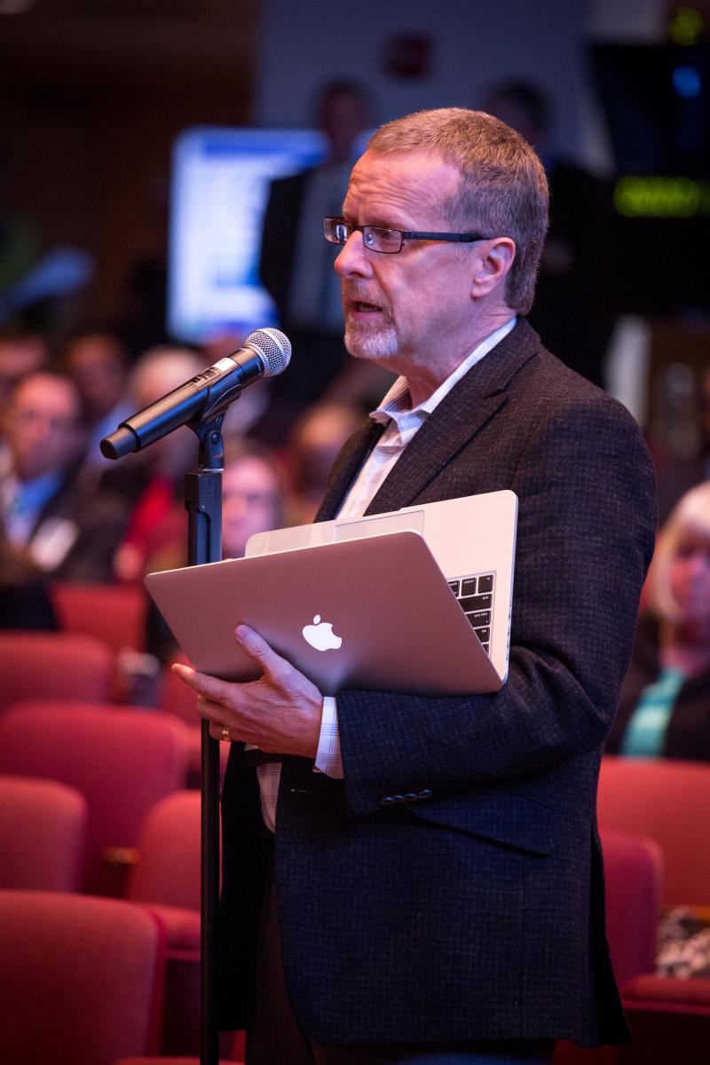 Randy Roberts, senior pastor of the Loma Linda University Seventh-day Adventist Church, reads the motion that was voted during the second half of the discussion on Oct. 31. Photo by Dan Weber